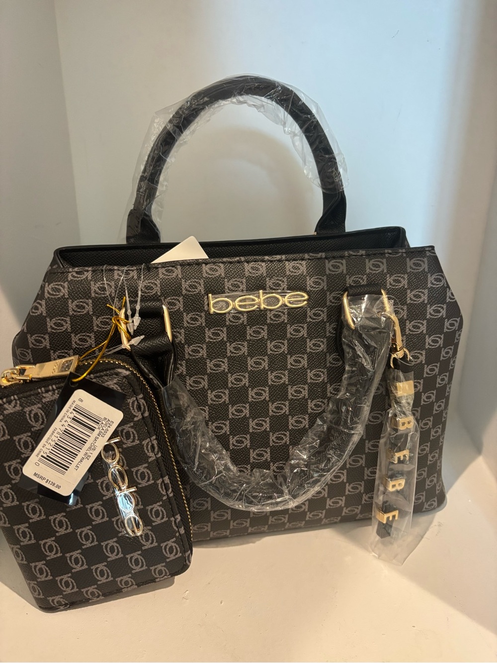 bebe Monogram Tote in black with Gold Accents